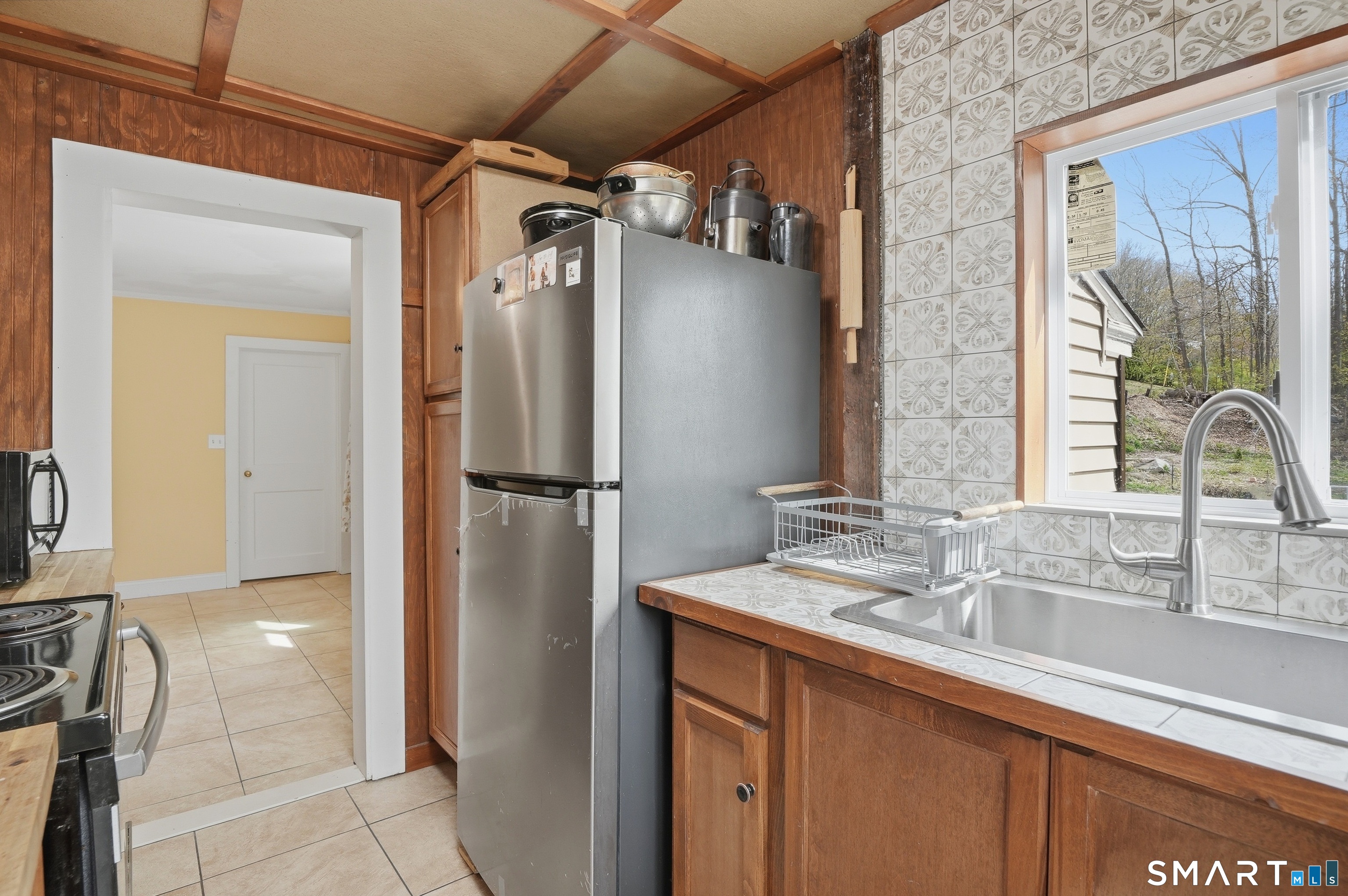 46 Pleasant Street Torrington, CT 06790 - Photo 11 of 40 a bathroom with a sink and a mirror