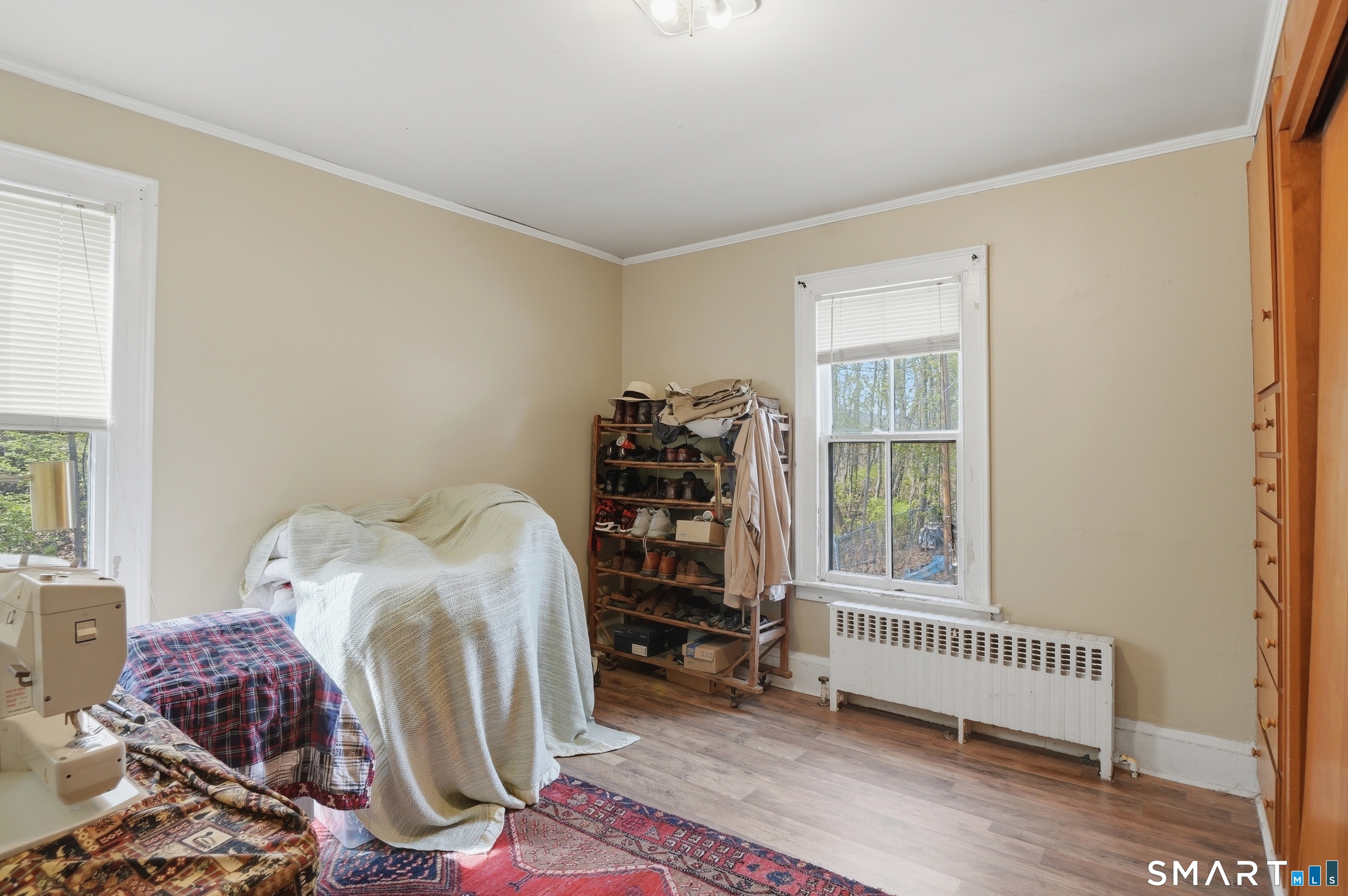 46 Pleasant Street Torrington, CT 06790 - Photo 16 of 40 a bedroom with a bed and a window