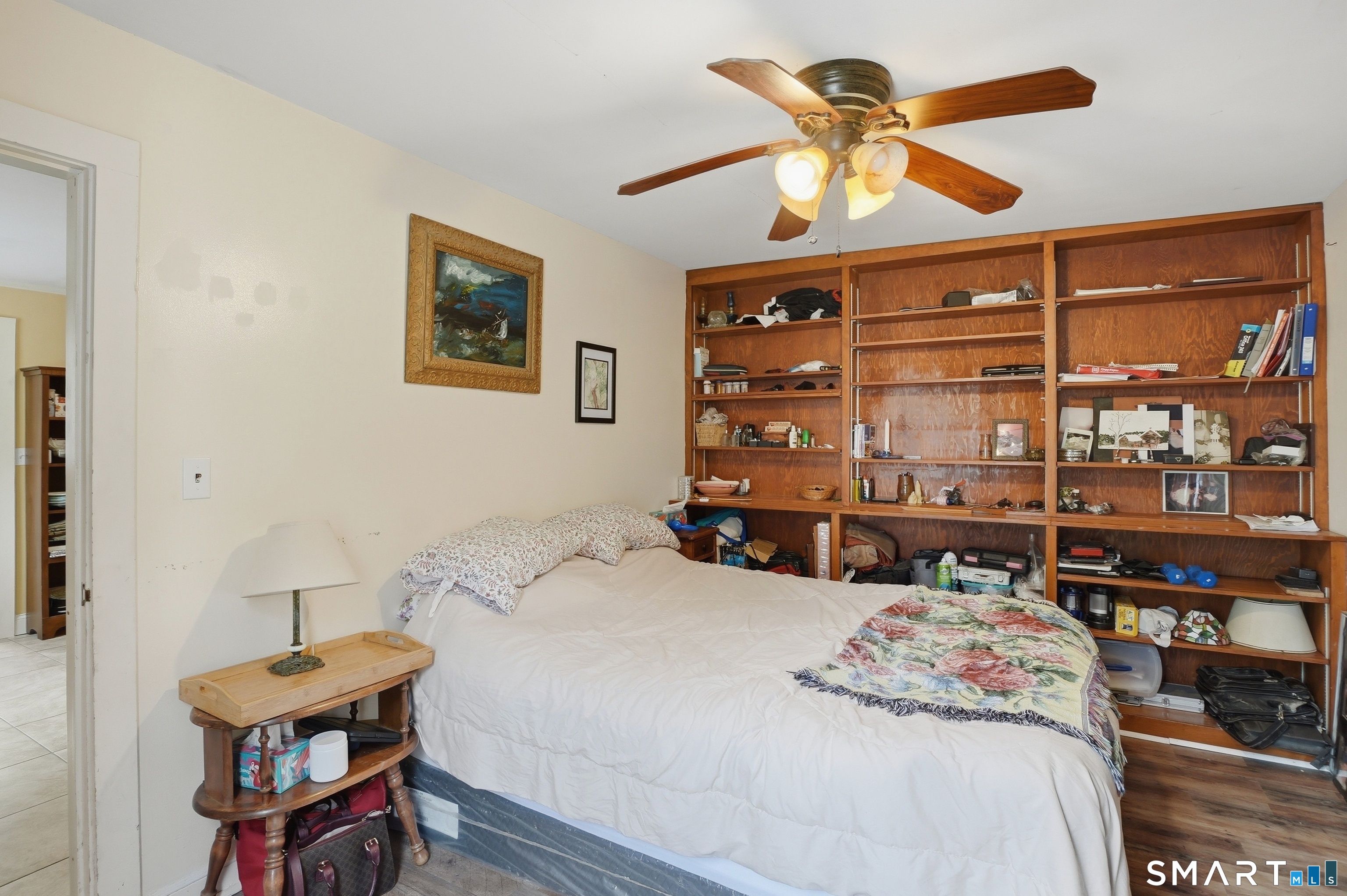 46 Pleasant Street Torrington, CT 06790 - Photo 20 of 40 a bedroom with a bed and a chandelier