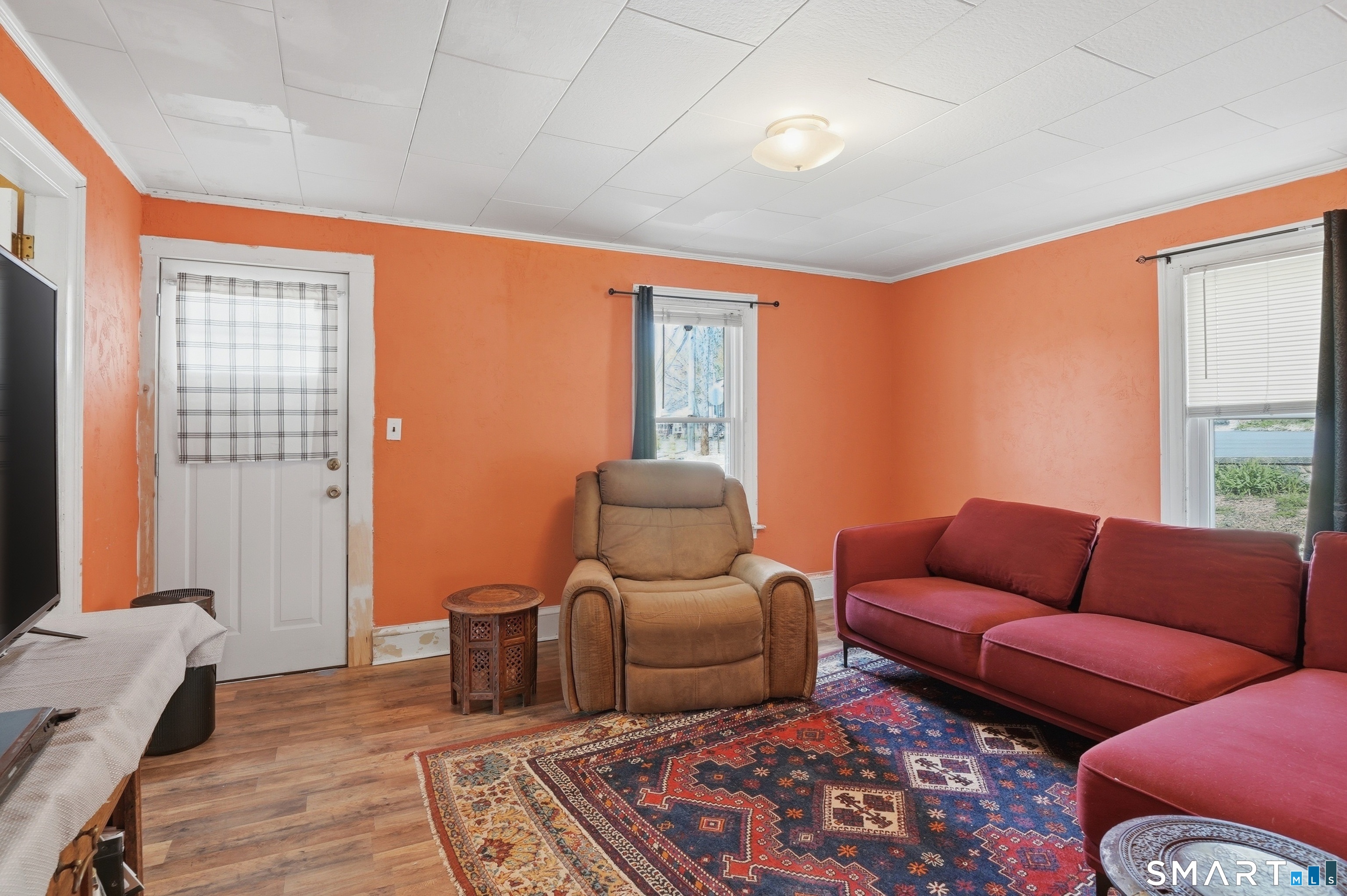 46 Pleasant Street Torrington, CT 06790 - Photo 22 of 40 a bedroom with furniture or couch and a window
