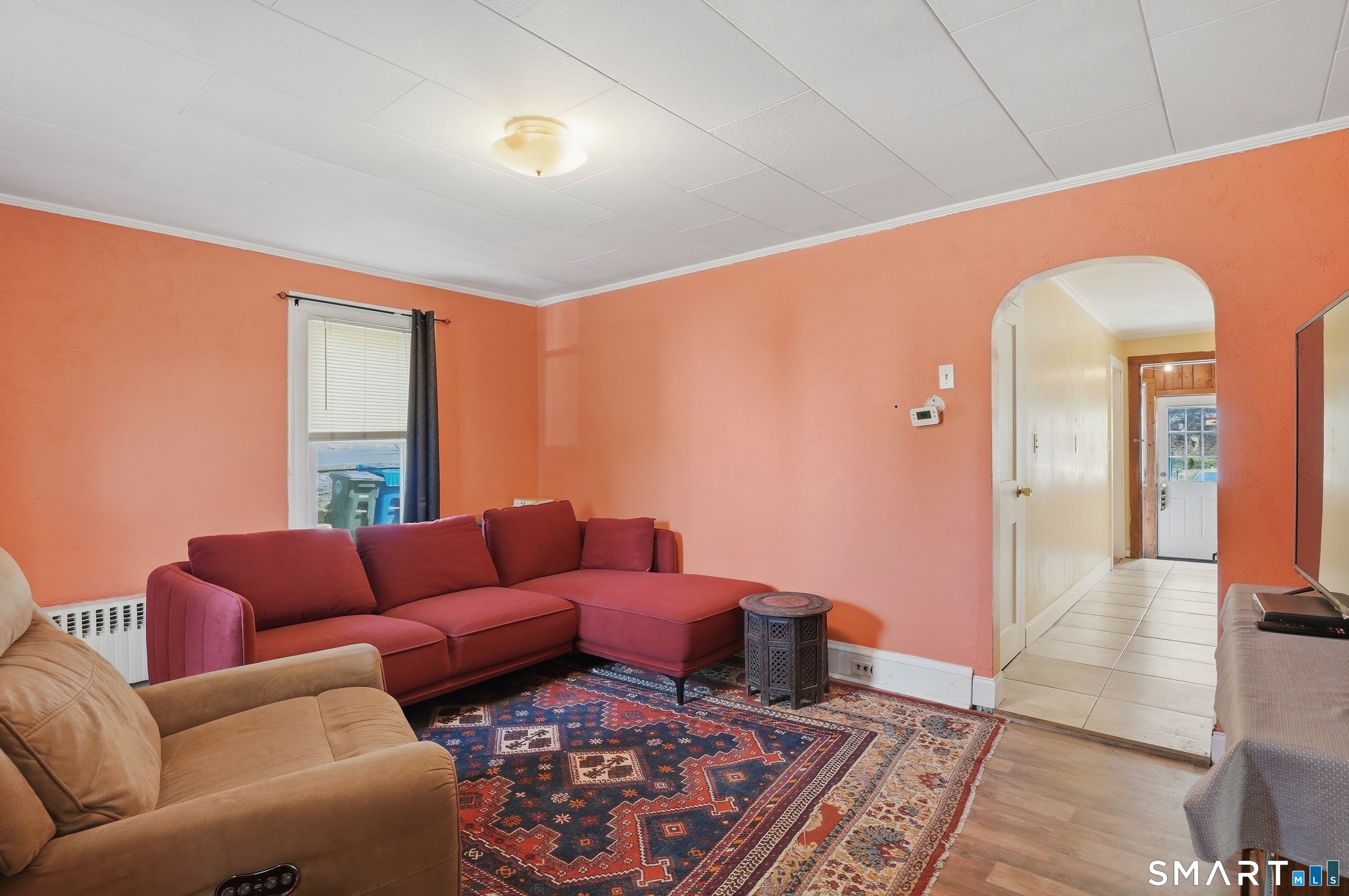 46 Pleasant Street Torrington, CT 06790 - Photo 23 of 40 a living room with furniture and a rug