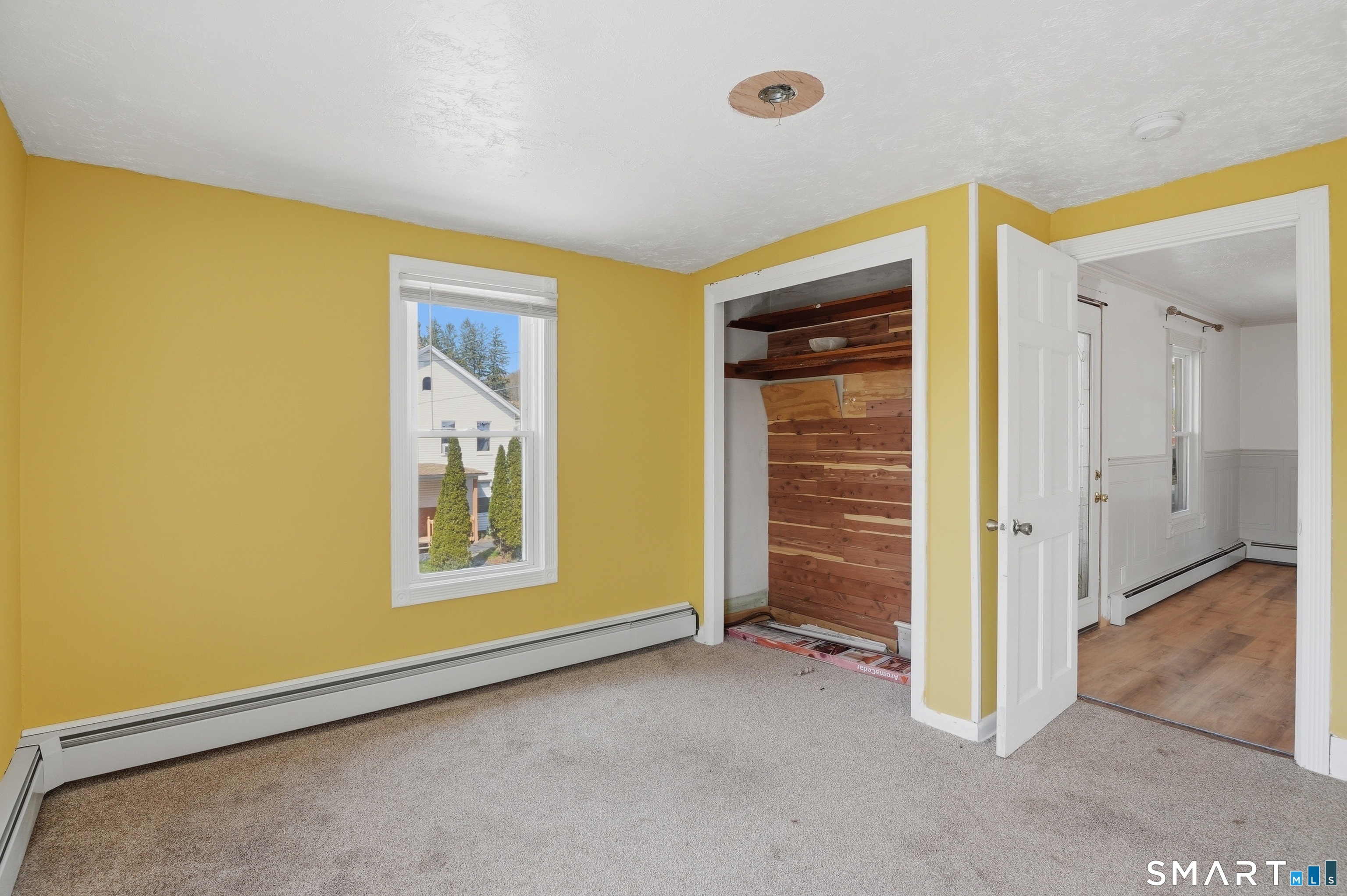 46 Pleasant Street Torrington, CT 06790 - Photo 34 of 40 an empty room with windows