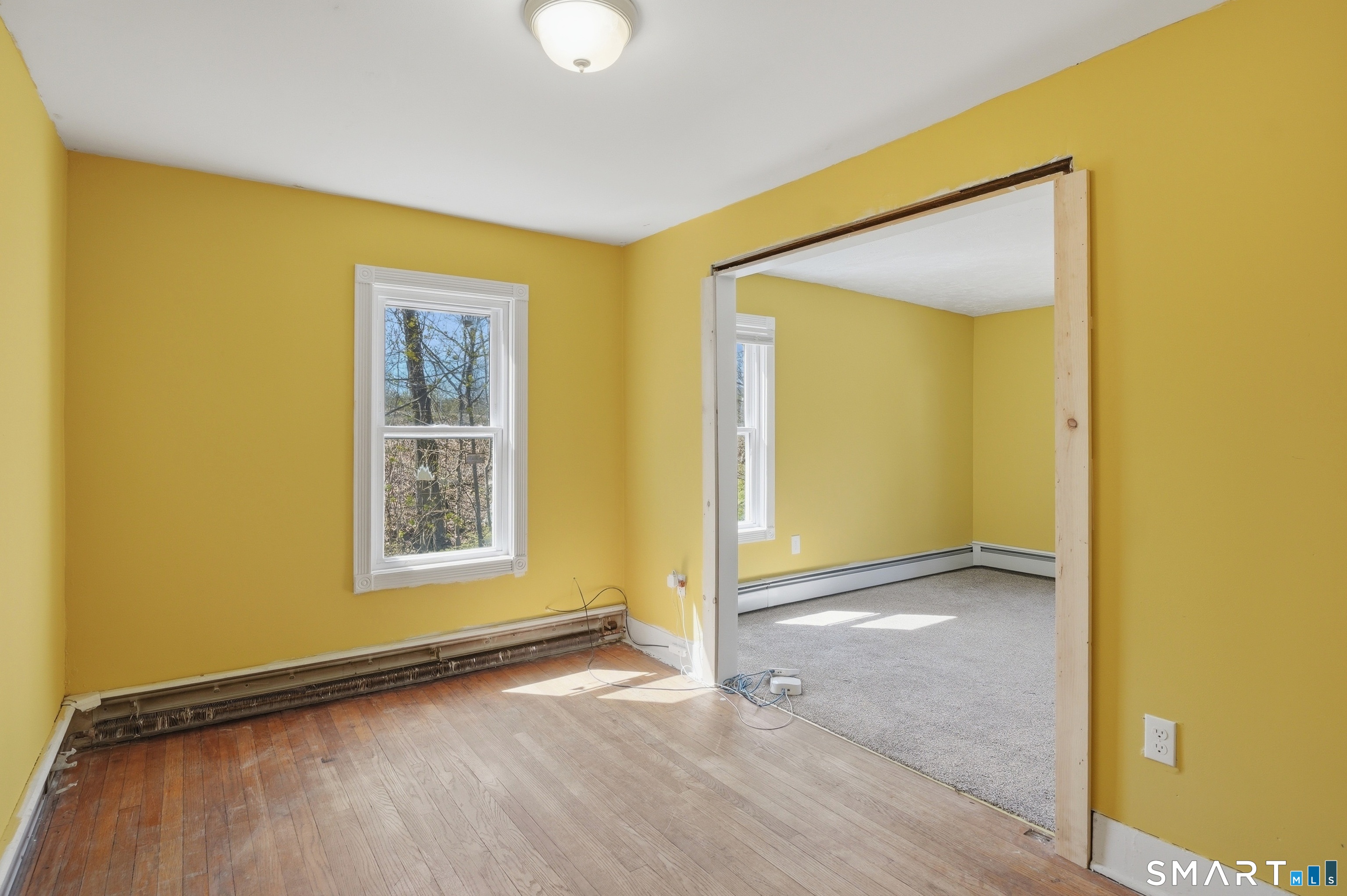 46 Pleasant Street Torrington, CT 06790 - Photo 35 of 40 an empty room with windows