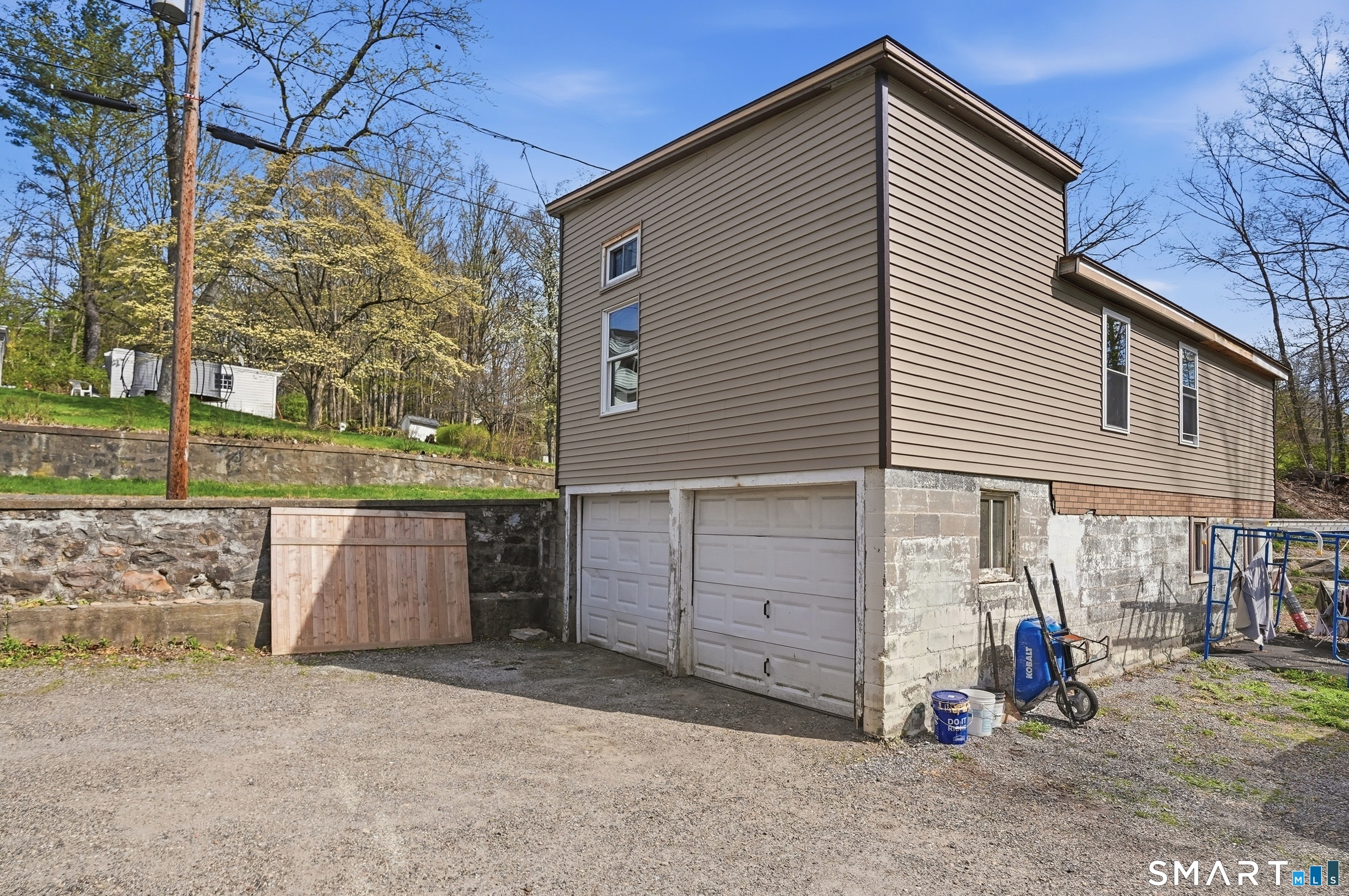 46 Pleasant Street Torrington, CT 06790 - Photo 36 of 40 a view of a house with a yard