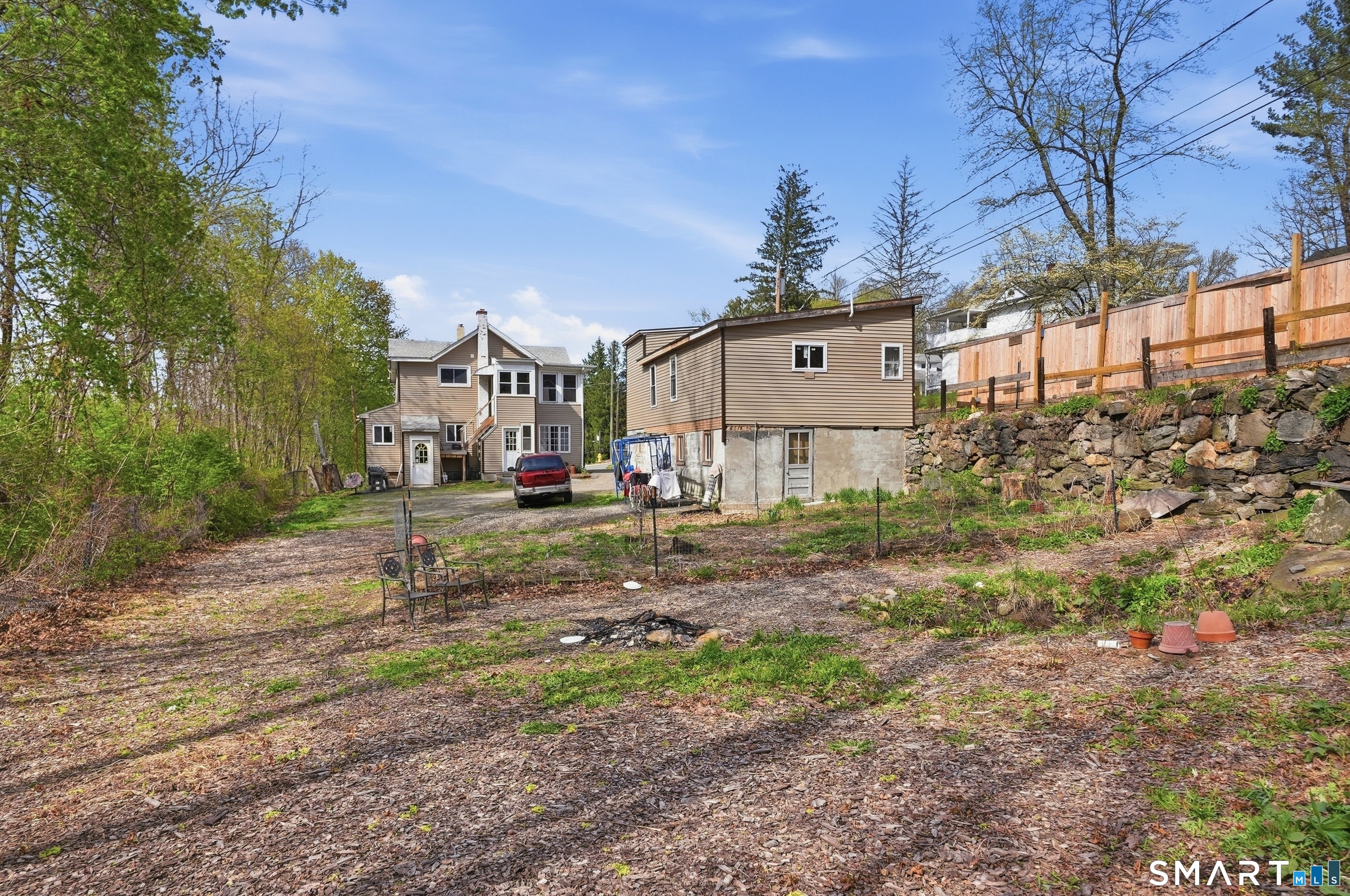 46 Pleasant Street Torrington, CT 06790 - Photo 40 of 40 a view of a house with a yard