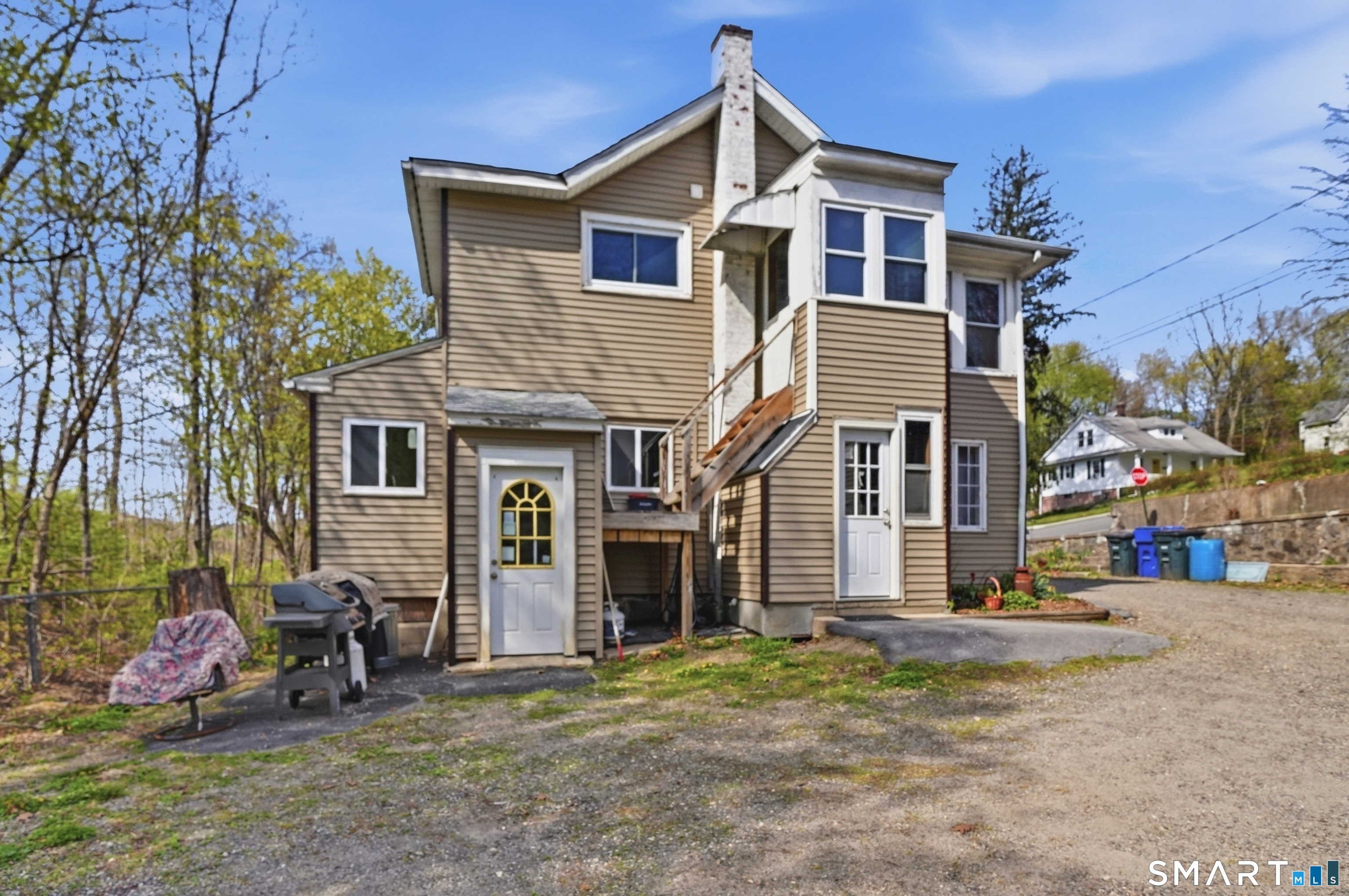 46 Pleasant Street Torrington, CT 06790 - Photo 5 of 40 a front view of a house with a yard