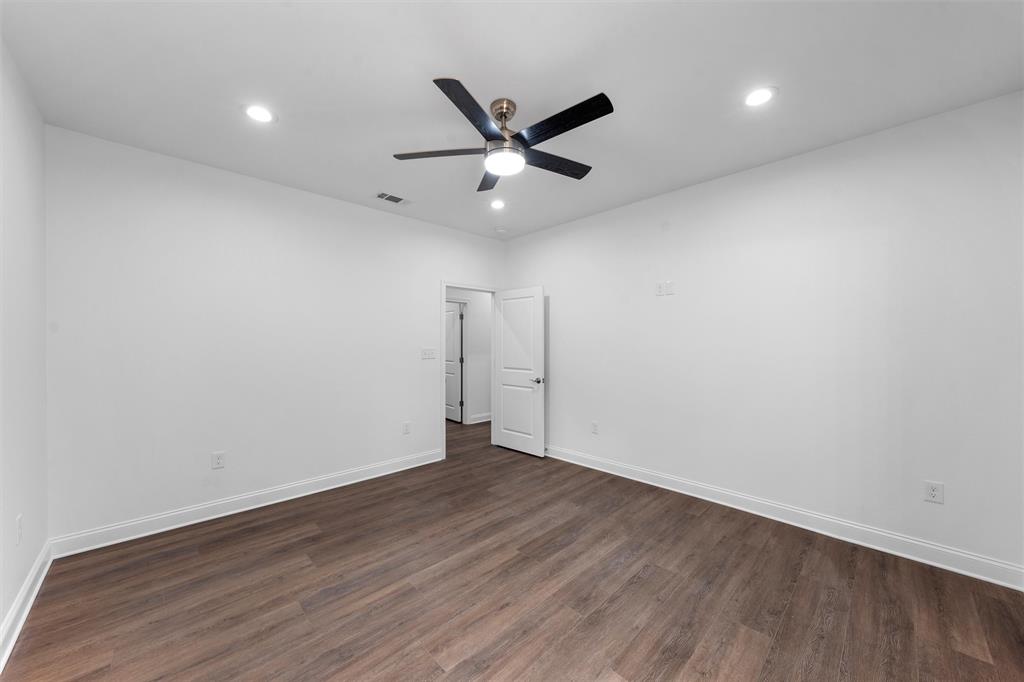 1698 Rogers Hill Road Waco, TX 76705 - Photo 22 of 40 Unfurnished bedroom featuring dark wood finished floors, baseboards, recessed lighting, and a ceiling fan