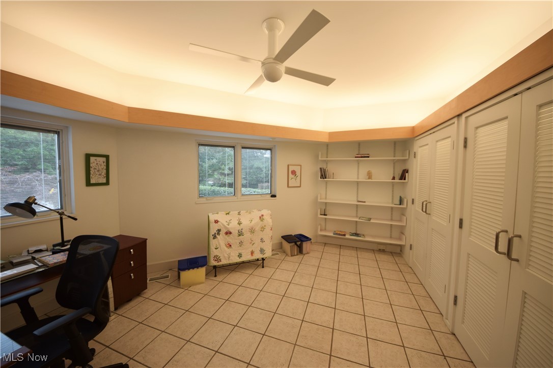 3559 Birchtree Path Cleveland, OH 44121 - Photo 16 of 37 Home office with light tile patterned flooring, a ceiling fan, and healthy amount of natural light