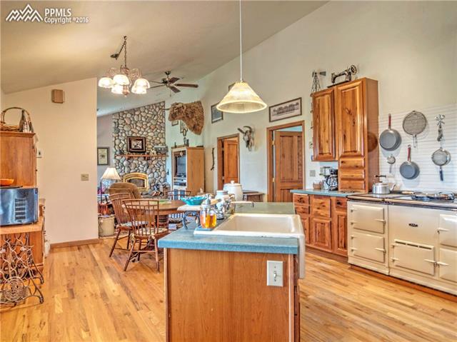 40550 Funk Road Ramah, CO 80832 - Photo 30 of 31 Desirable open floor plan. Notice the gorgeous sink and that amazing AGA stove!!!