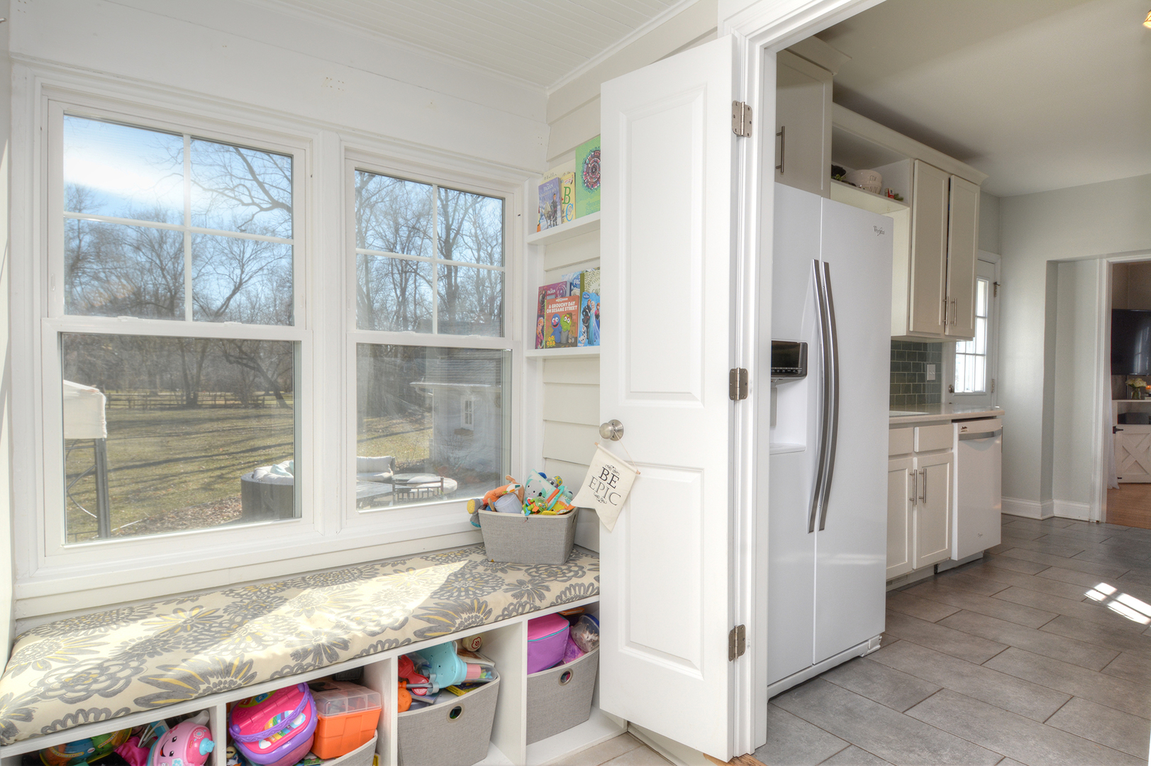 31W755 Army Trail Road Wayne, IL 60184 - Photo 14 of 34 a kitchen with granite countertop a refrigerator and a sink