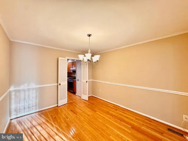a bathroom with a granite countertop sink and mirror
