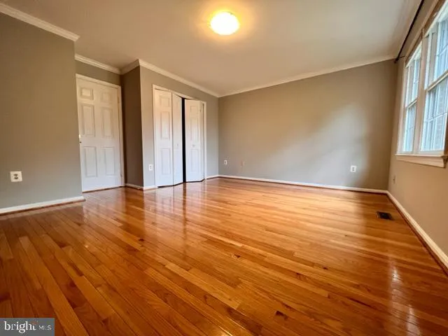 a bathroom with a granite countertop toilet sink and bathtub