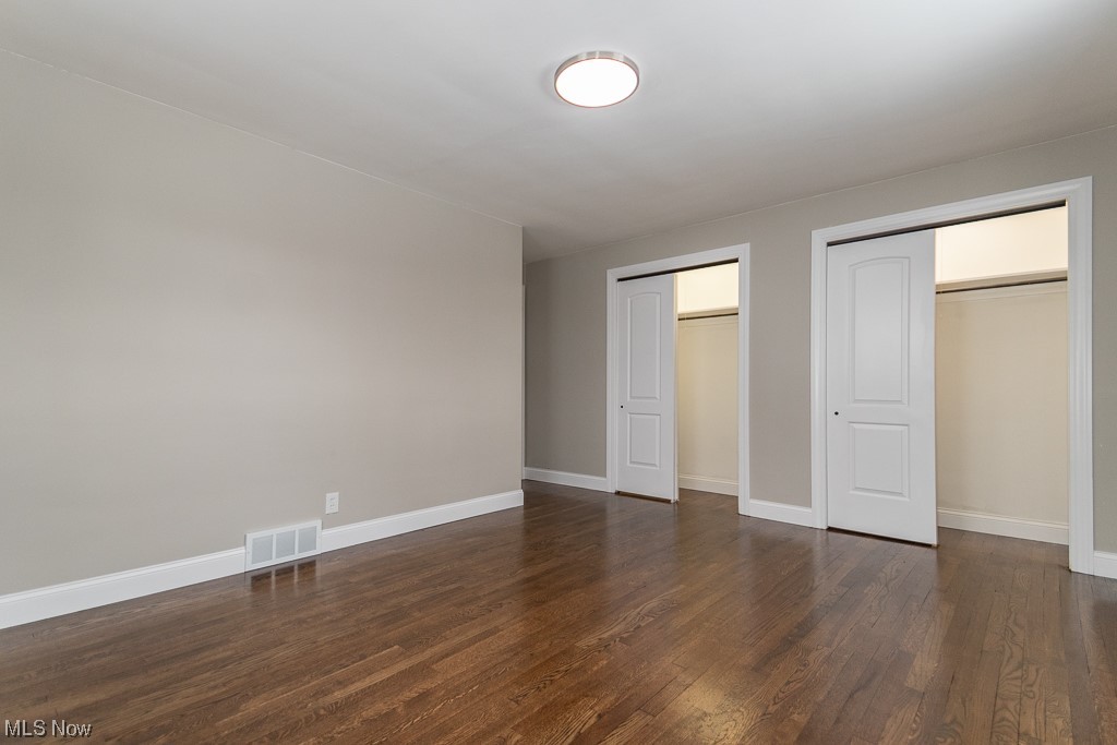4980 Emmet Road Lyndhurst, OH 44124 - Photo 18 of 39 Unfurnished bedroom with dark hardwood / wood-style flooring
