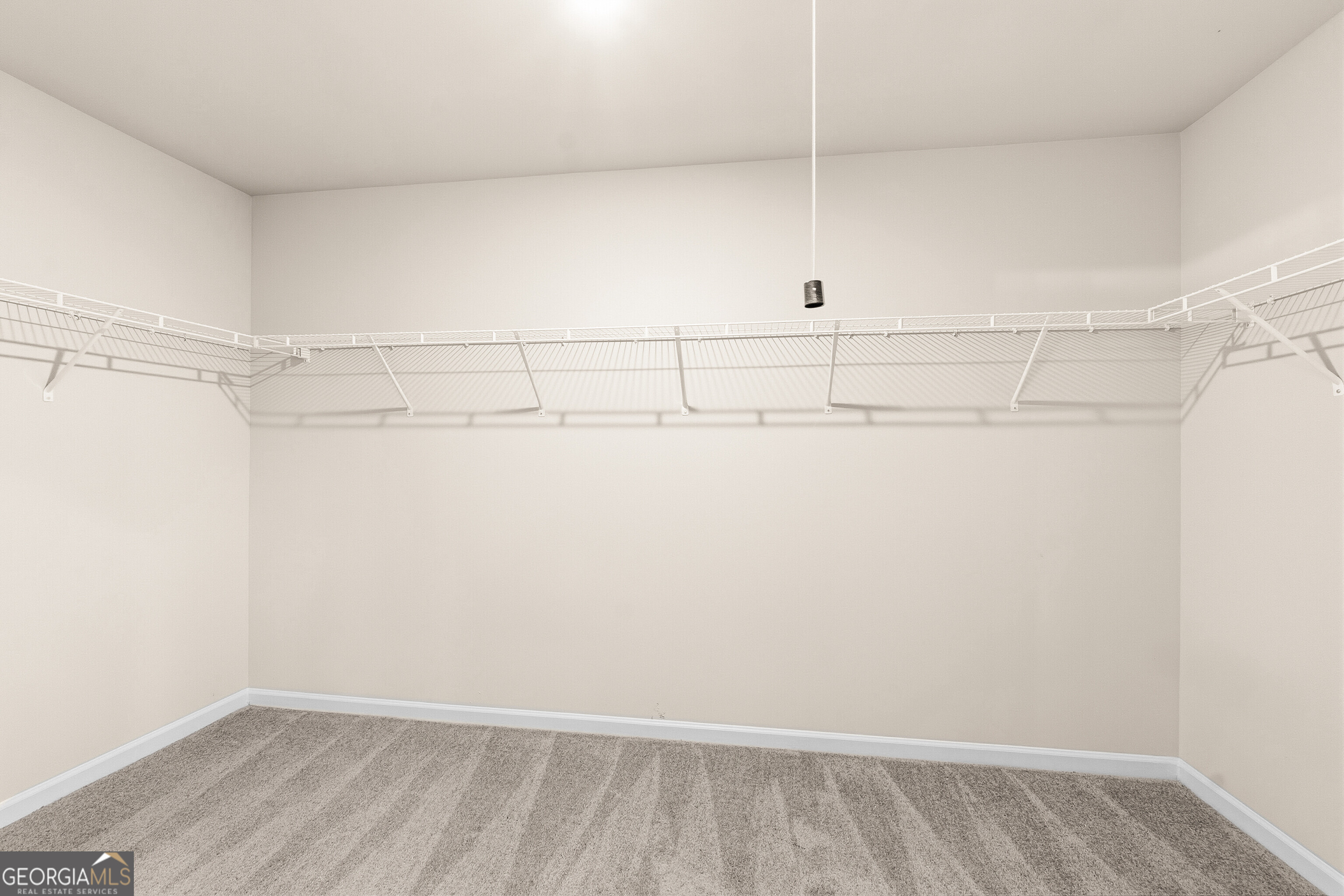 1649 Stokes Store Road, Unit 52 Forsyth, GA 31029 - Photo 49 of 73 a view of a closet