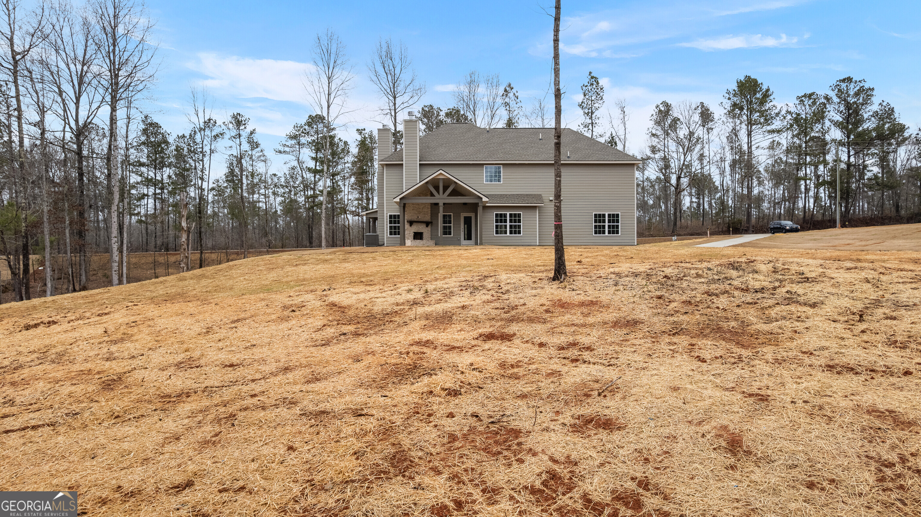1649 Stokes Store Road, Unit 52 Forsyth, GA 31029 - Photo 67 of 73 a house view with a outdoor space