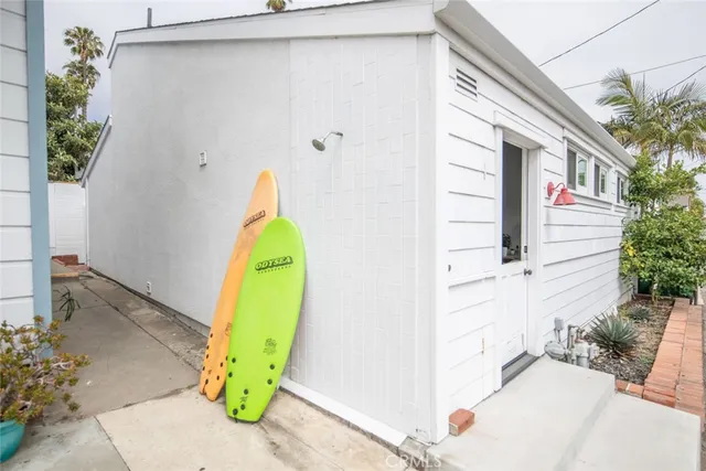 a view of a swimming pool with a potted plants