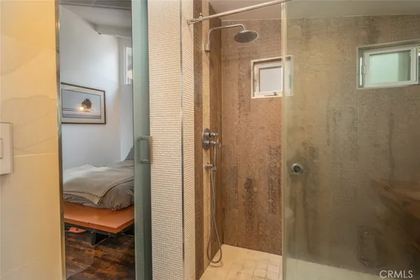 a view of bedroom and bathroom