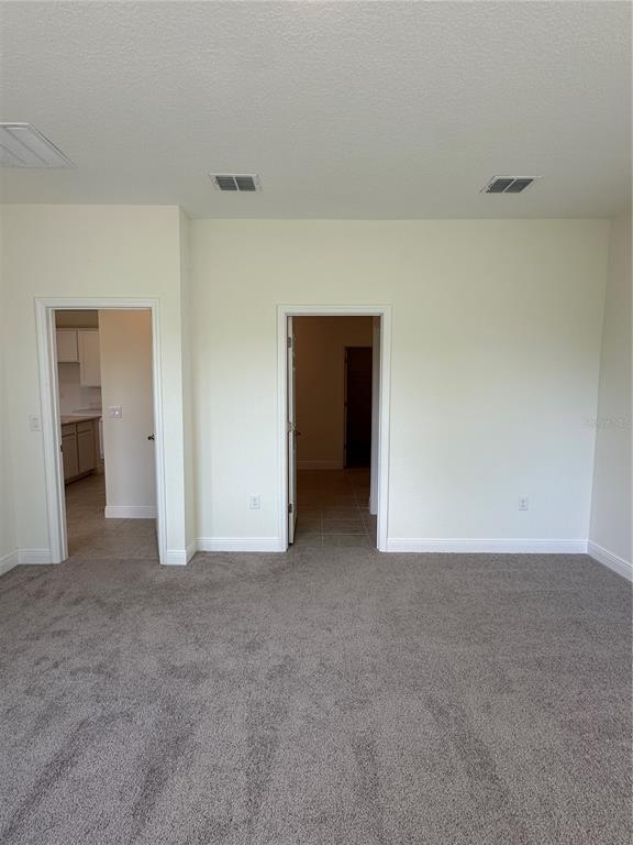 6107 Southwest 115th Street Road Ocala, FL 34476 - Photo 5 of 16 a view of an empty room
