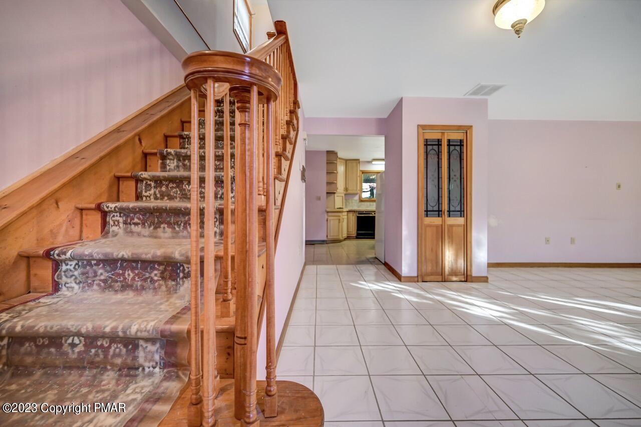 145 Gap View Circle Bushkill, PA 18324 - Photo 11 of 37 a view of an entryway with staircase