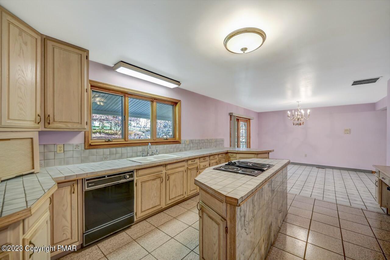 145 Gap View Circle Bushkill, PA 18324 - Photo 13 of 37 a kitchen with a stove and a sink