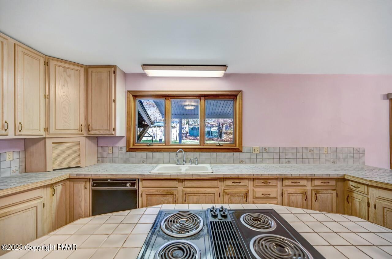 145 Gap View Circle Bushkill, PA 18324 - Photo 14 of 37 a kitchen with a stove and a sink