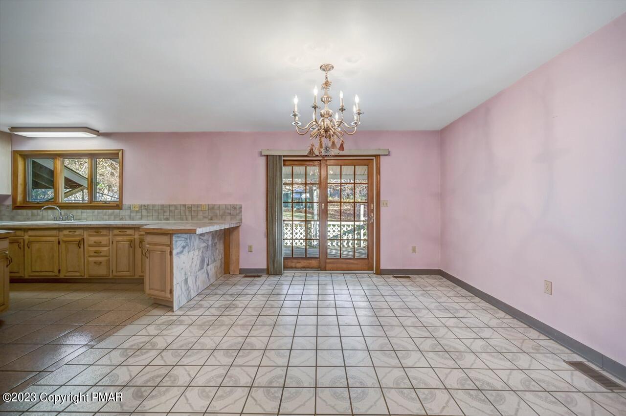 145 Gap View Circle Bushkill, PA 18324 - Photo 18 of 37 a view of a kitchen with a sink and a window