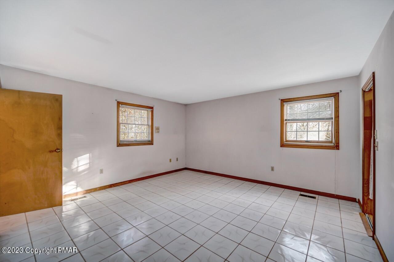 145 Gap View Circle Bushkill, PA 18324 - Photo 22 of 37 a view of an empty room with a window