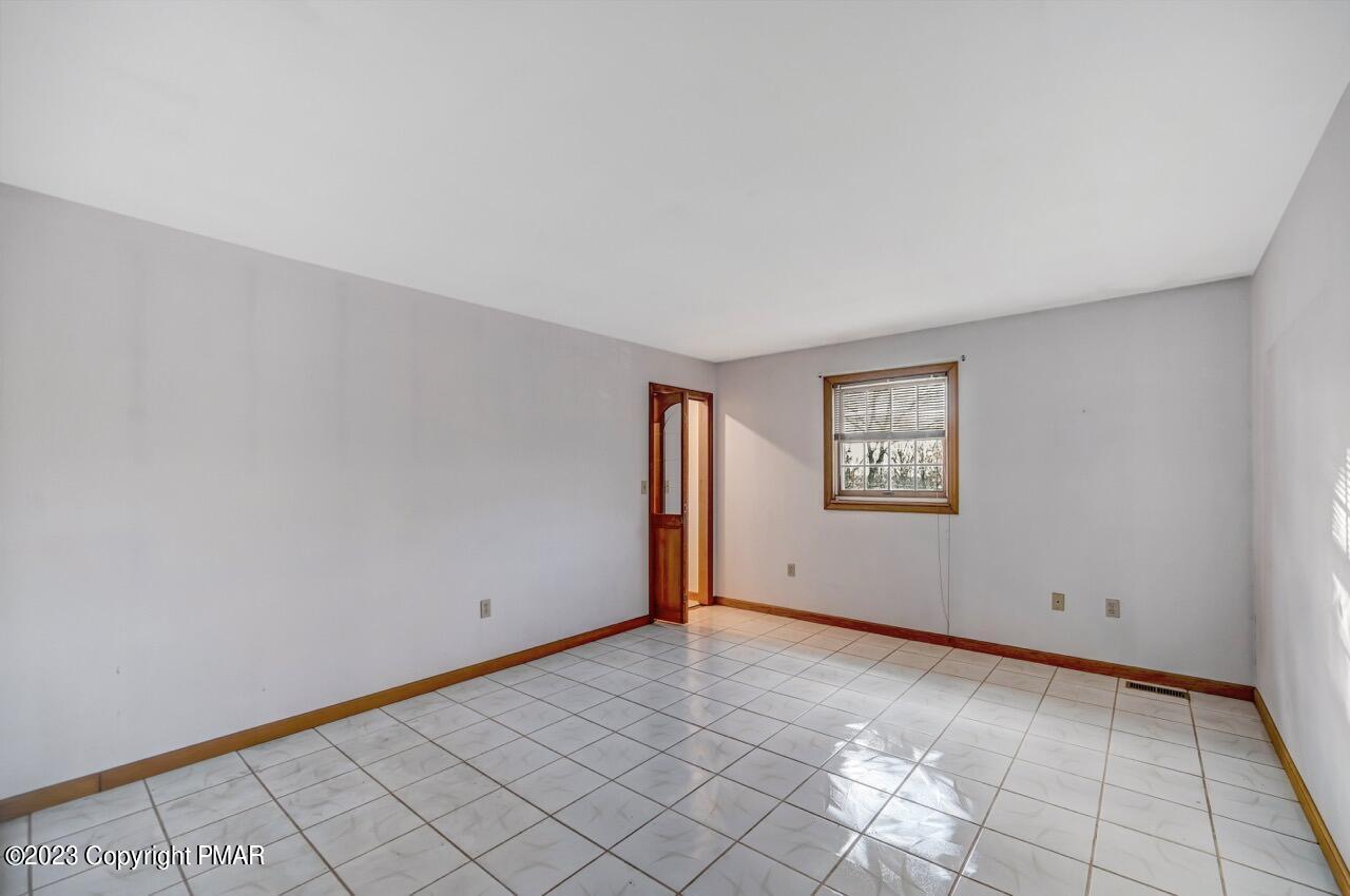 145 Gap View Circle Bushkill, PA 18324 - Photo 27 of 37 a view of an empty room and window