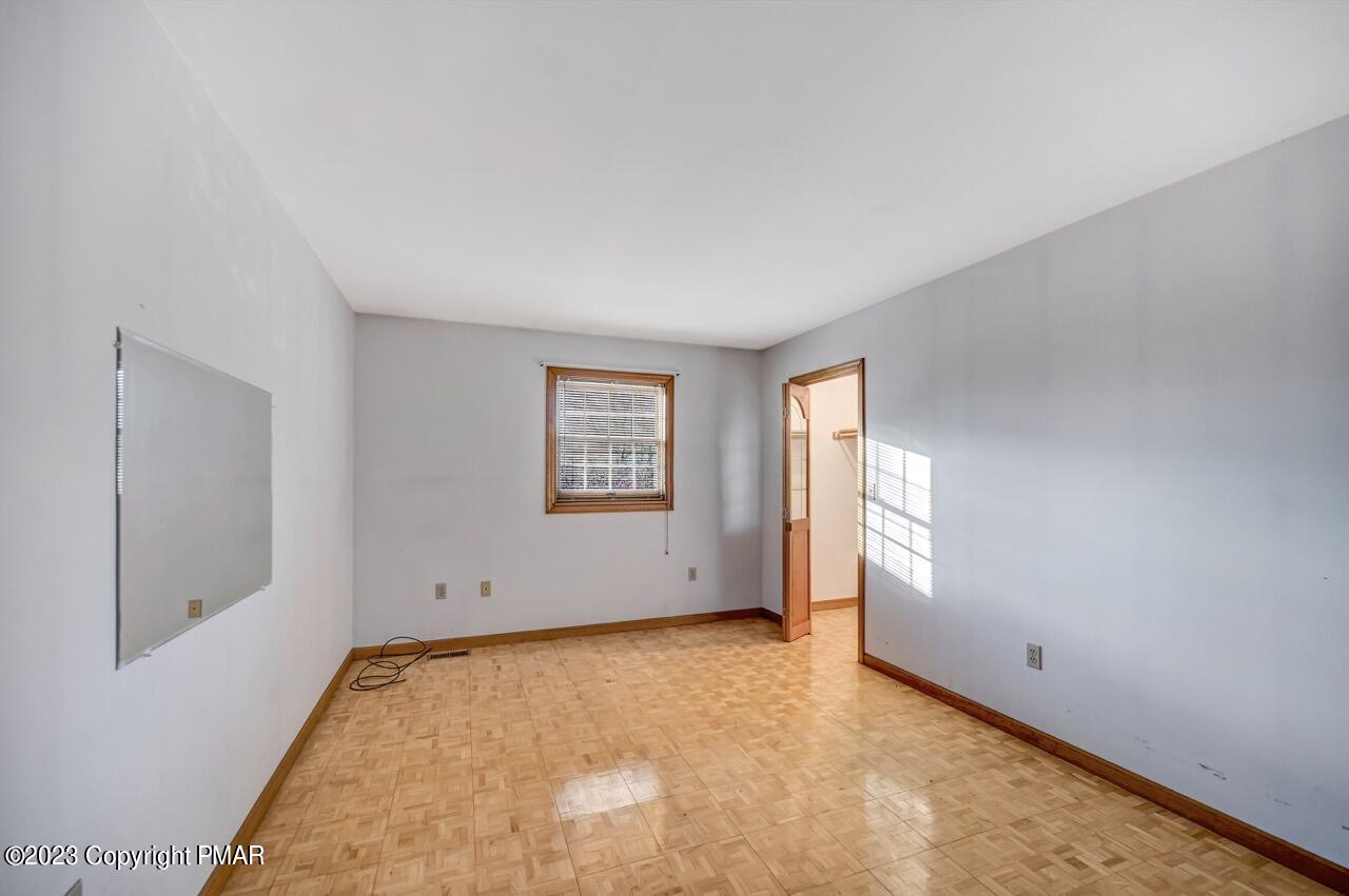 145 Gap View Circle Bushkill, PA 18324 - Photo 30 of 37 an empty room with windows