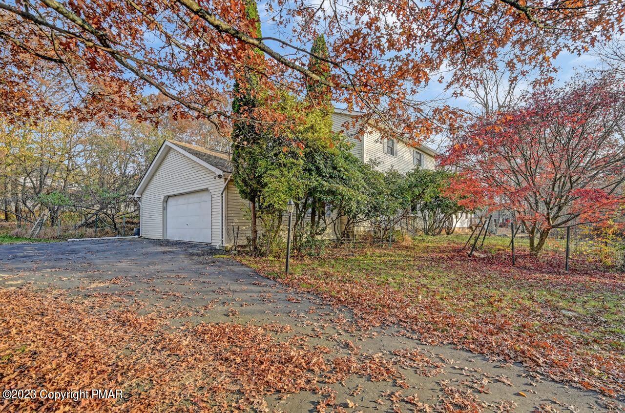 145 Gap View Circle Bushkill, PA 18324 - Photo 3 of 37 a view of backyard of house with green space