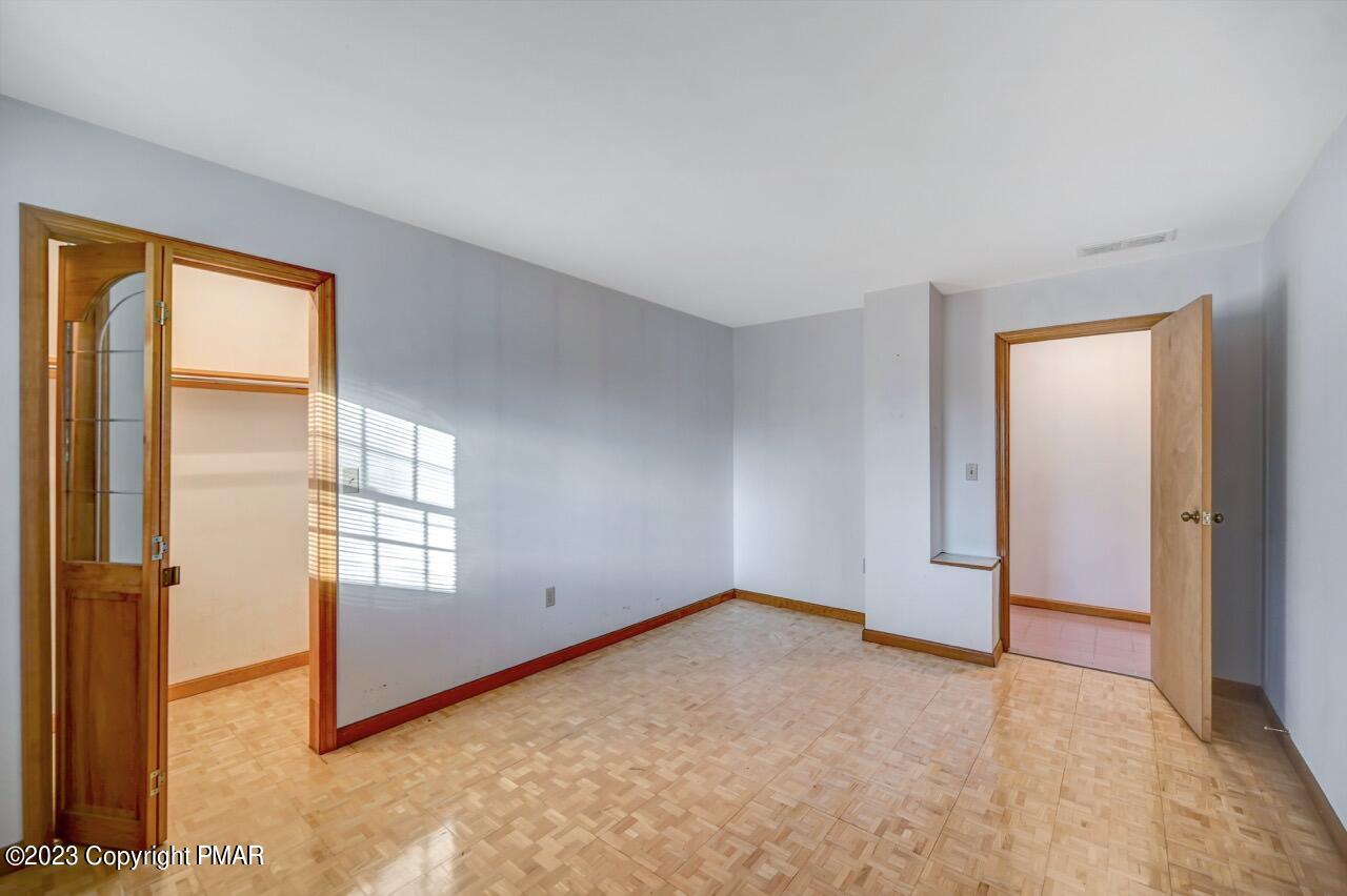 145 Gap View Circle Bushkill, PA 18324 - Photo 31 of 37 an empty room with windows