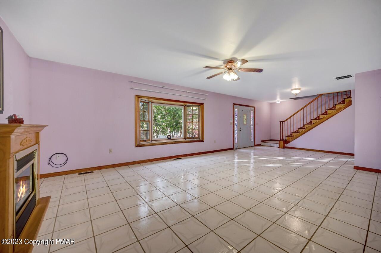 145 Gap View Circle Bushkill, PA 18324 - Photo 6 of 37 a view of an empty room with a window
