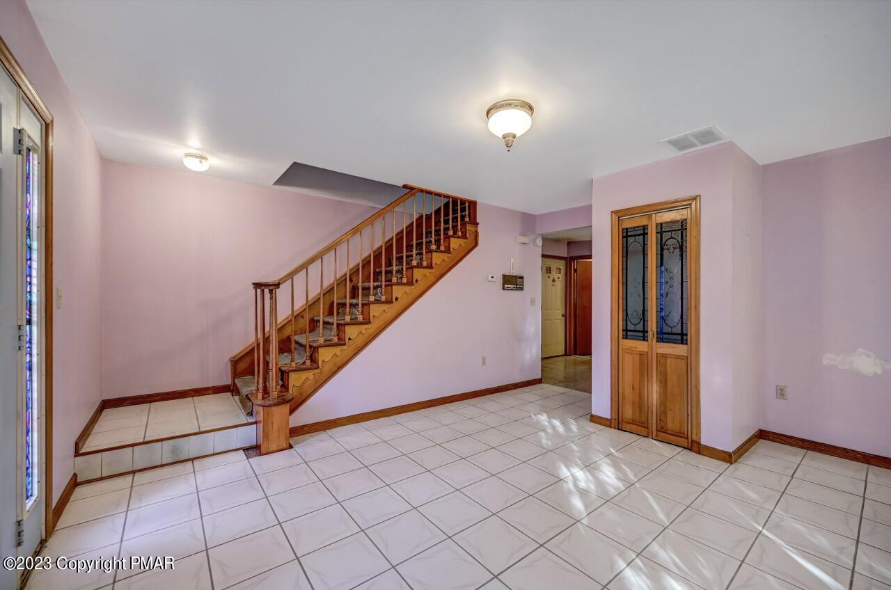 145 Gap View Circle Bushkill, PA 18324 - Photo 10 of 37 a view of an entryway with a workspace