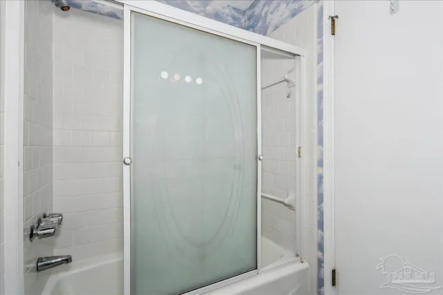 a bathroom with a bathtub