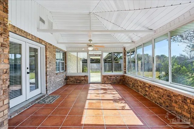 a lobby with glass door and glass door