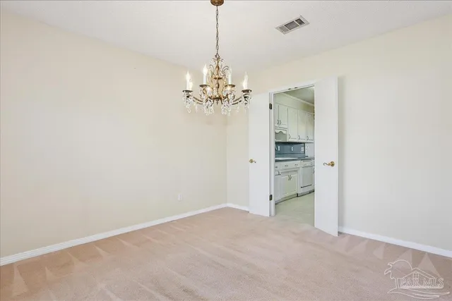 a view of a chandelier in a room