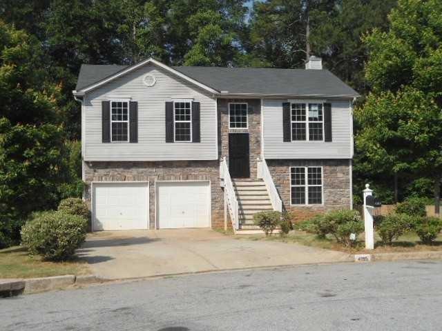 4155 Island View Court Decatur, GA 30034 - Photo 1 of 1 a front view of a house with a garden