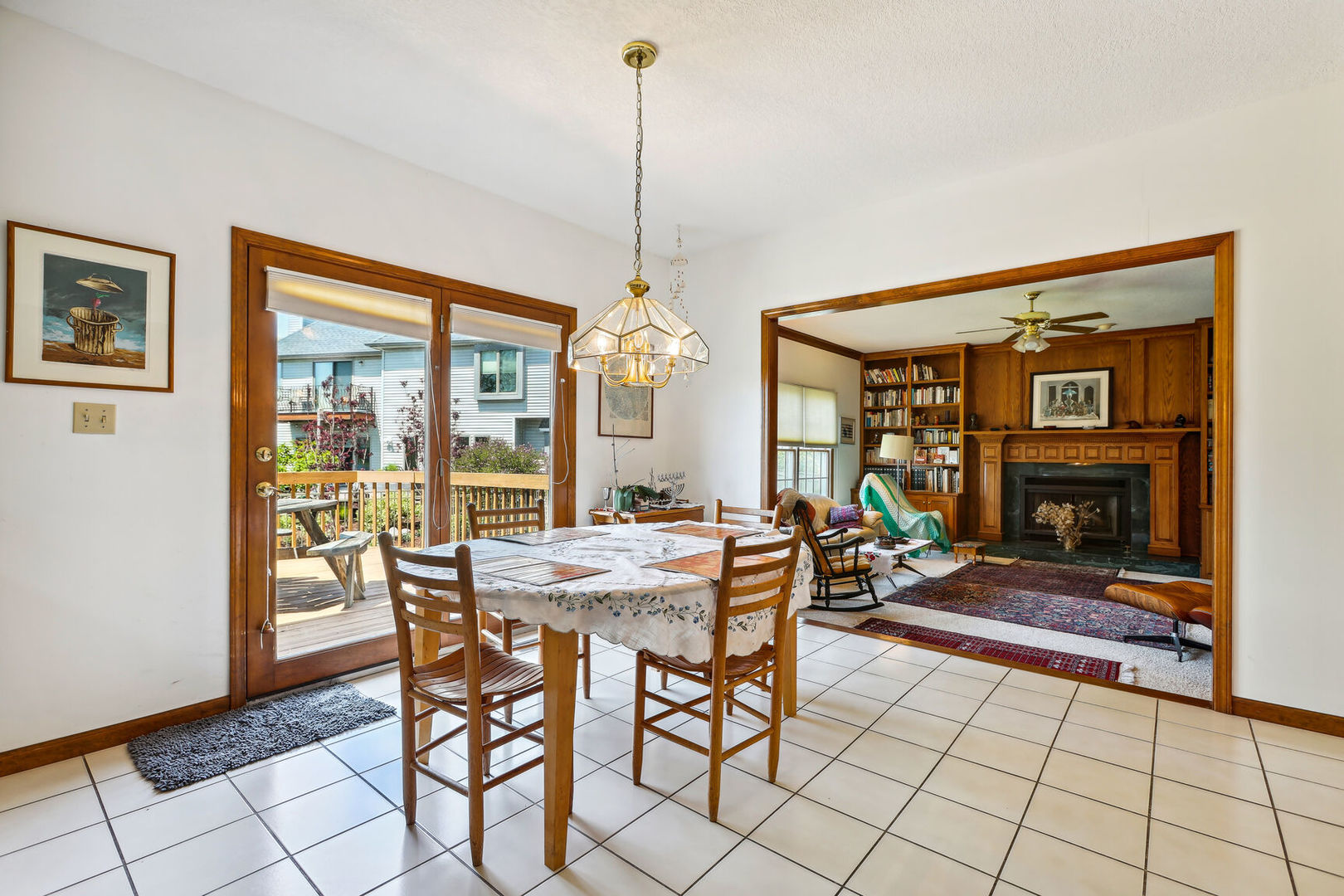 2203 Edgewater Place Champaign, IL 61822 - Photo 11 of 35 a dining room filled with furniture and a chandelier