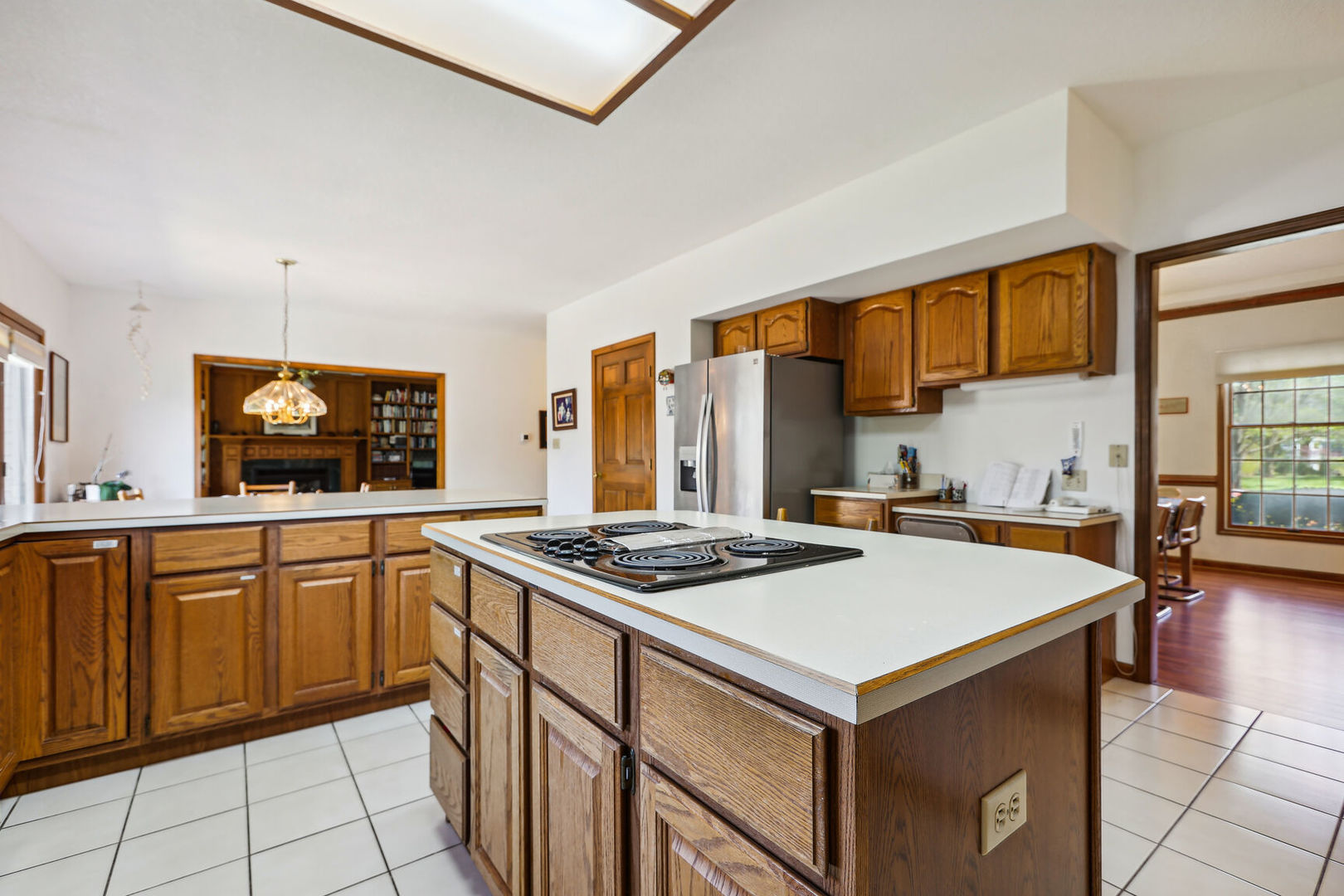 2203 Edgewater Place Champaign, IL 61822 - Photo 15 of 35 a kitchen with a stove a sink and a refrigerator