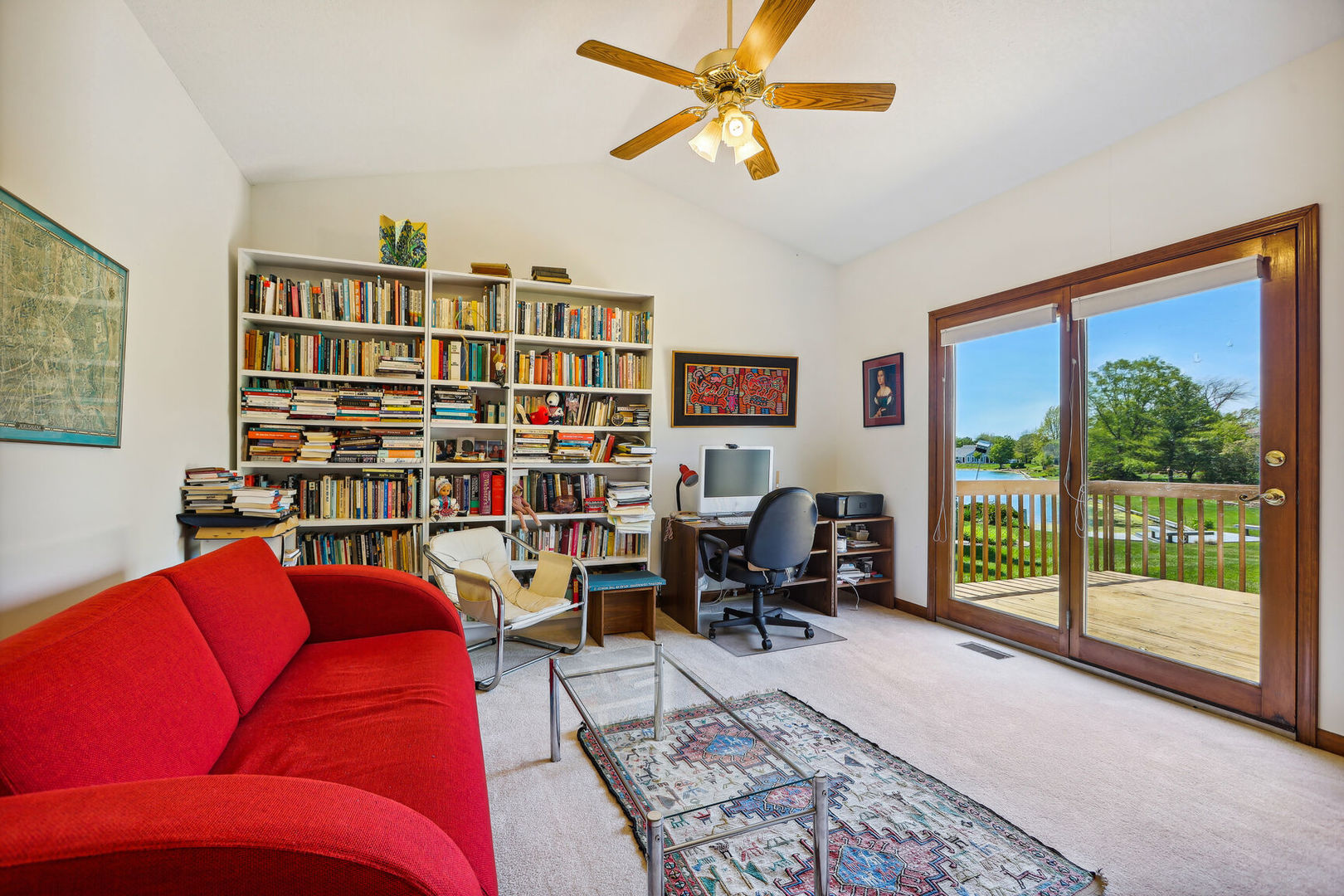 2203 Edgewater Place Champaign, IL 61822 - Photo 18 of 35 a living room with furniture and a book shelf