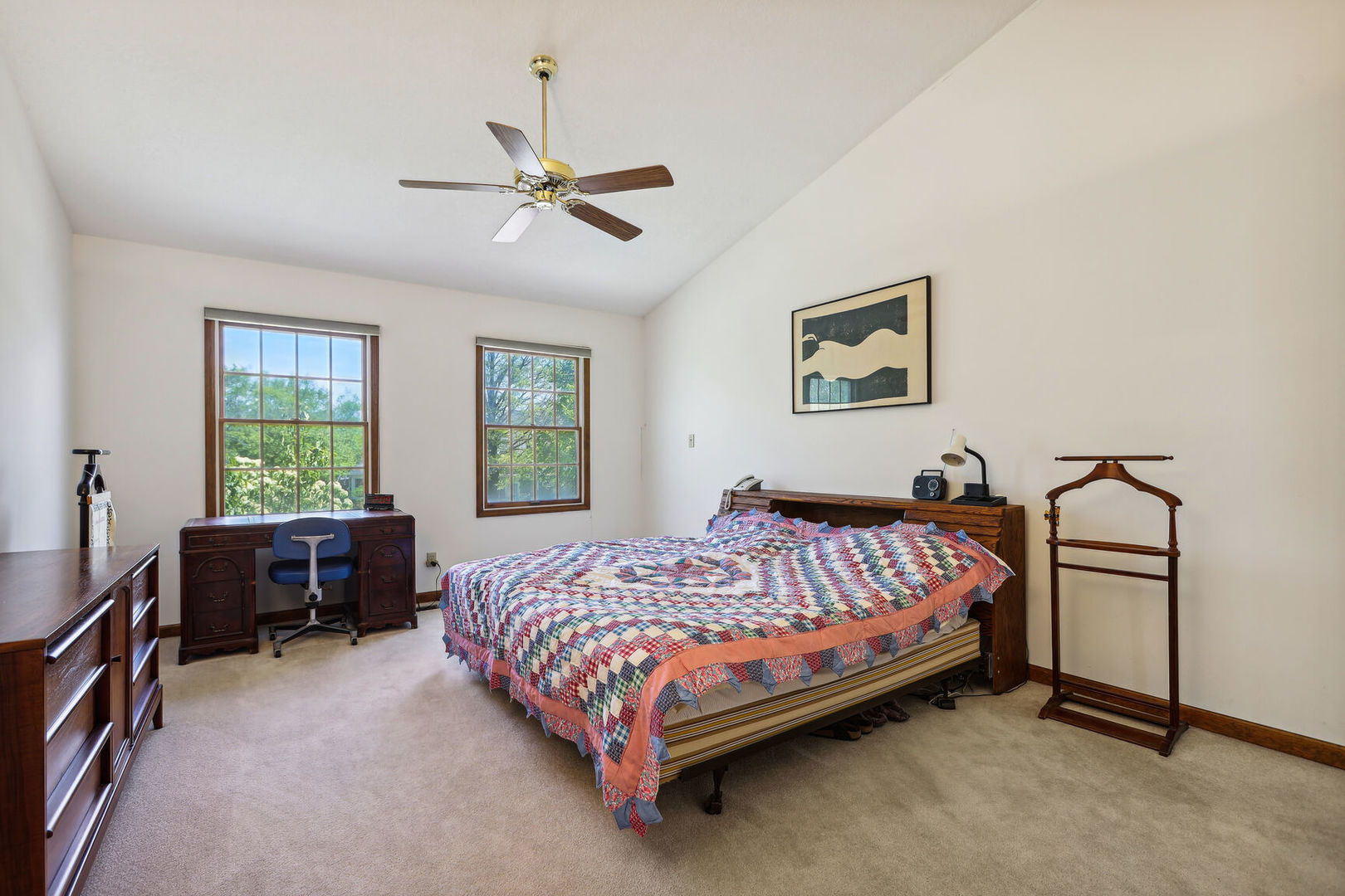 2203 Edgewater Place Champaign, IL 61822 - Photo 22 of 35 a bedroom with a bed and a chandelier