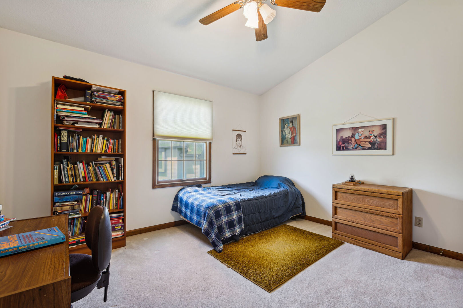 2203 Edgewater Place Champaign, IL 61822 - Photo 27 of 35 a living room with furniture and a book shelf
