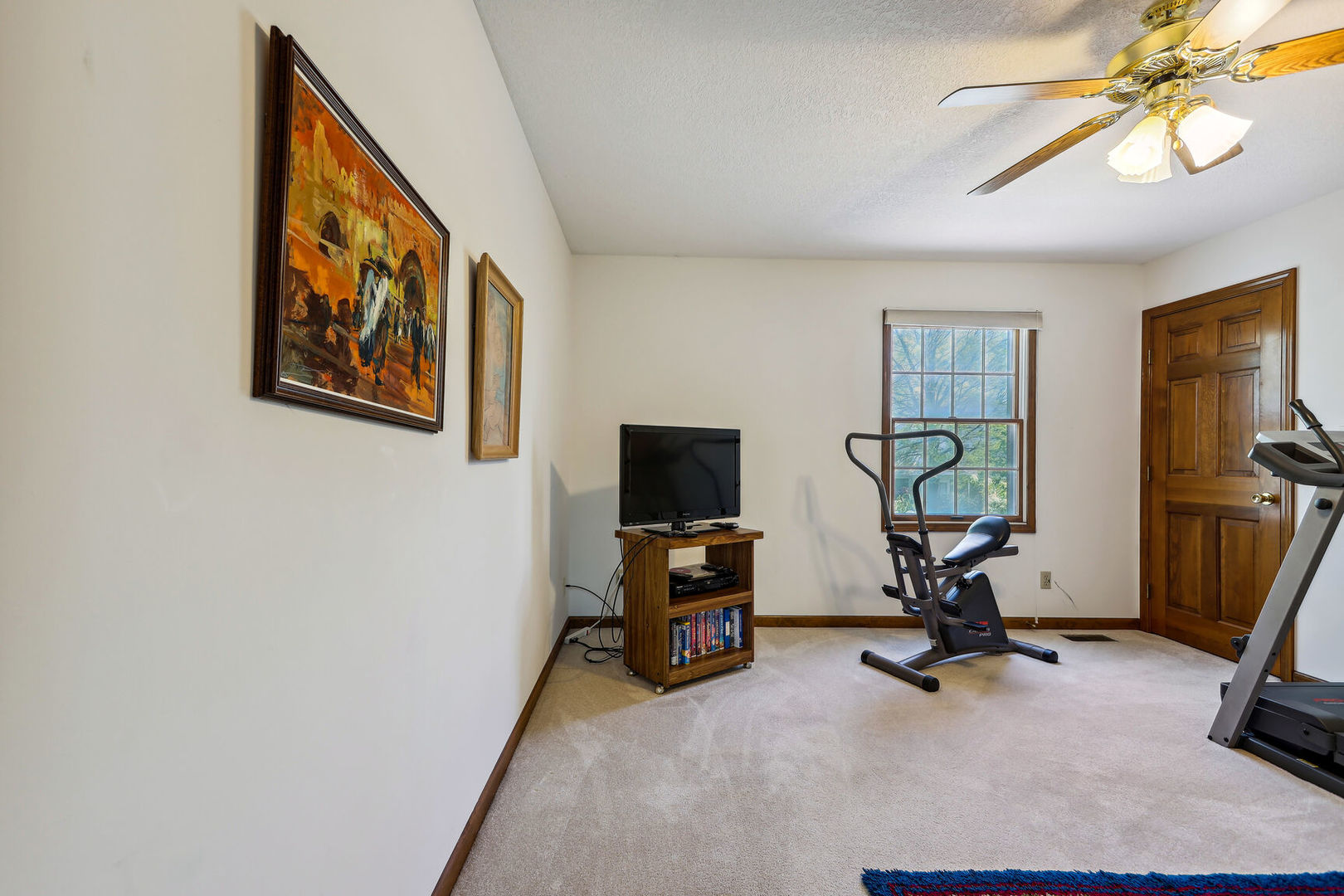 2203 Edgewater Place Champaign, IL 61822 - Photo 29 of 35 a view of a room with gym equipment