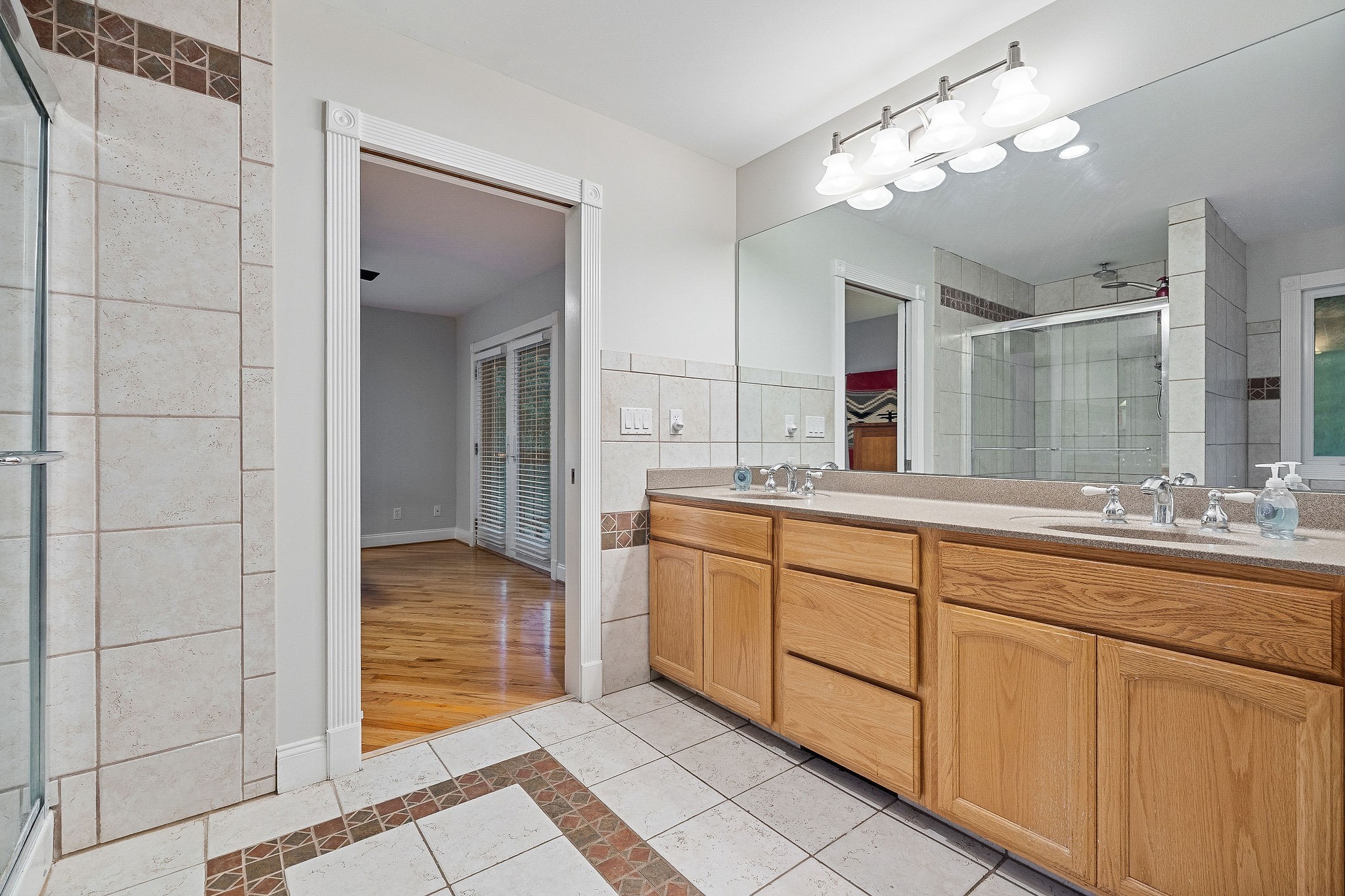 574 Hayes Ridge Road Lancaster, TN 38569 - Photo 21 of 48 a bathroom with a sink and a mirror