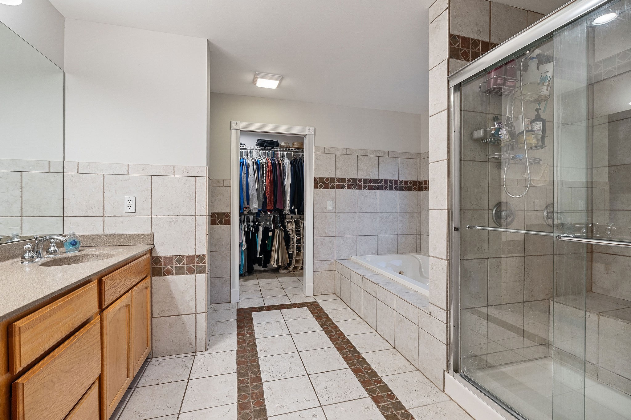 574 Hayes Ridge Road Lancaster, TN 38569 - Photo 23 of 48 a bathroom with a sink a toilet and shower