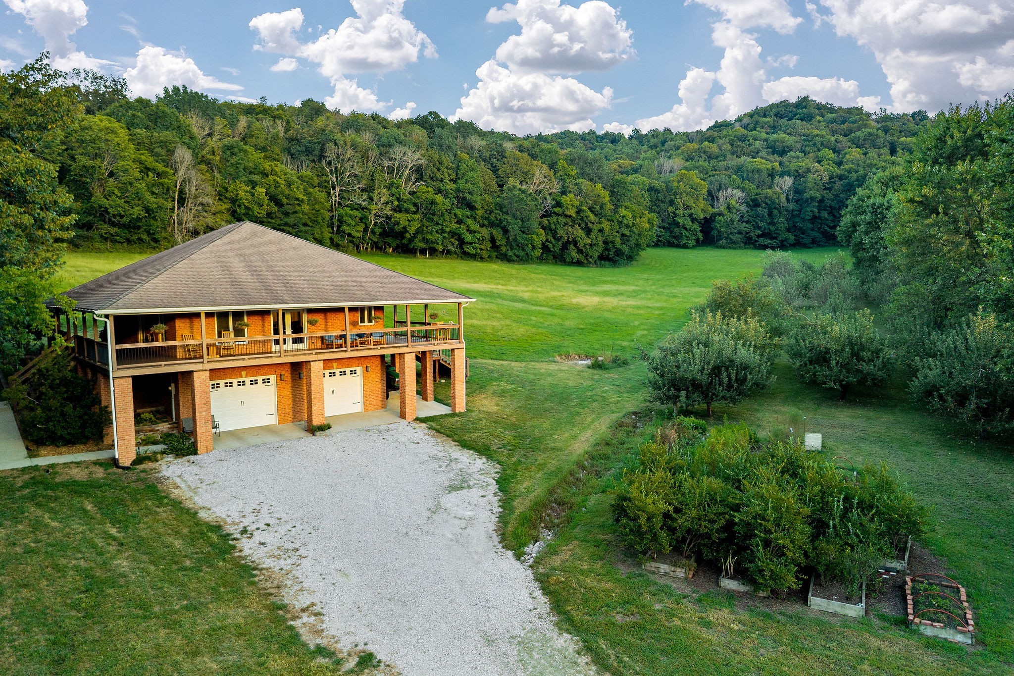 574 Hayes Ridge Road Lancaster, TN 38569 - Photo 44 of 48 a front view of a house with a yard