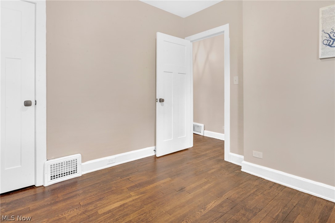 3218 Tullamore Road Cleveland, OH 44118 - Photo 23 of 42 Spare room with dark hardwood / wood-style flooring