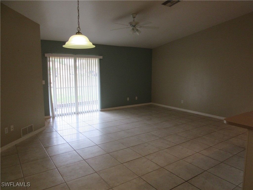 271 Southwest 4th Street, Unit 271 Cape Coral, FL 33991 - Photo 17 of 17 a view of an empty room with a window