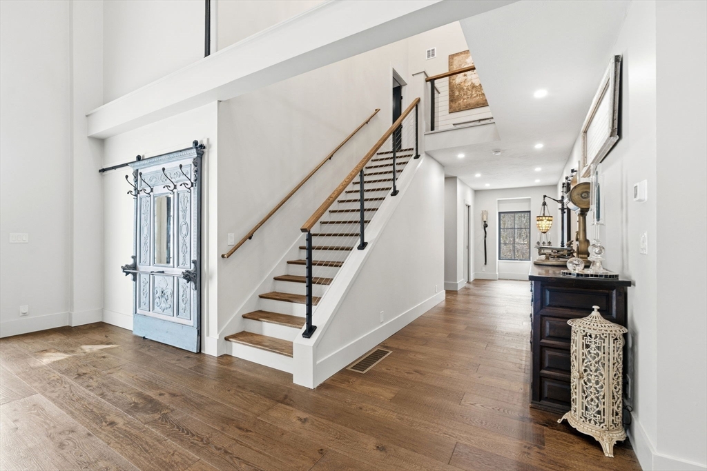 41 Myrtle Street Norfolk, MA 02056 - Photo 23 of 42 a view of entryway and hall with wooden floor