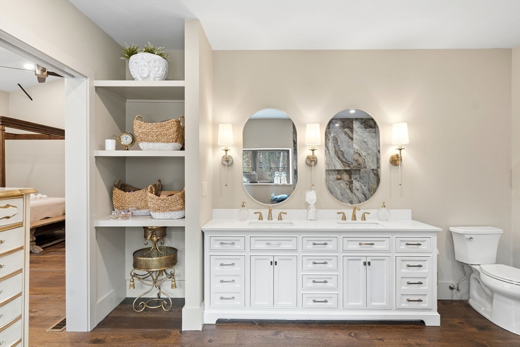 41 Myrtle Street Norfolk, MA 02056 - Photo 27 of 42 a bathroom with a double vanity sink and a mirror